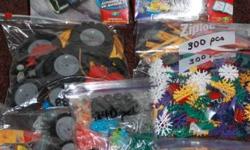 IF YOU ARE READING THIS AD THAN THE ITEM IS STILL AVAILABLE.
I have here over 1000 pieces of K'nex parts, 2 motorized kits in boxes, 1 is unopened  in a box on the left of photo &  the third 1 is loose in a bag at bottom of photo, plus a bag full of mini