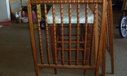 1 brown Jenny Lind Crib For Sale  $70.00