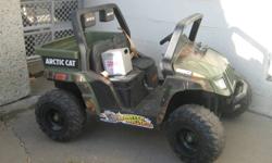 Kids Arctic cat Riding electric jeep. Bought 2 years ago for $450.00+tax and my son has grown out of it as he is turning 6 now. Looks and rides good,has seat belt straps tail gate that opens,3-speeds,slow,fast,reverse,2nd battery that was bought that