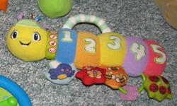 fisher price catapillar toy plays musin,$5-baby einstein crib toy,lights up an plays music,$5.email if interested.