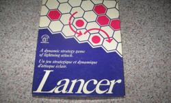 LANCER - Strategy board game
   - like Risk,
   - Checkers,
   - Chinese Checkers
                                                 
Two playing surfaces...one on each side of board...
   for two different versions of play.
 
Game of skill for players of