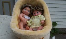 These rubber dolls are  from 1990, plug in back, very good condition.....check out my garage sale ad.