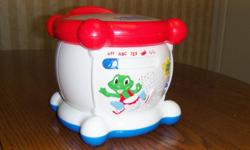 LeapFrog Learning Drum
Drum promotes motor skills and learning.
Four different settings.
Drum sounds out letters of the alphabet, numbers, musical notes, or a traditional drum sound for each tap.
Off control and 2 volume Electronic settings.