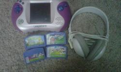 This is the whole set: 1 pink leapster with the charger, official leapster brand headphones, 4 games, and one pink over the shoulder carrying case (Lisa Simpson). It has been used by a kid, but still has many years use left in it.