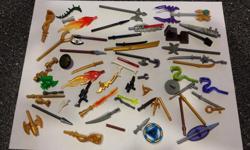 Set of accessories, weapons and snakes from Lego Lord of the Rings, Ninjago, Chima, The Hobbit and Star Wars. Includes everything in this picture. Hard to find items. Close to 50 pieces.