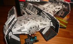 This set is 100% complete with all 1212 pieces. This set has been built, but it is in perfect condition. None of the pieces are damaged or broken in any way. This set comes with the original box and instruction booklet. This set is Adult owned and has