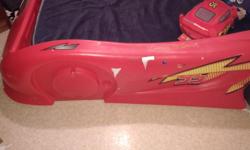 Slightly worn twin size Lightning McQueen Bed (Without Mattress), comes from a home that has been smoked in... Worked perfect as a toddler bed for both my son... Asking 150 OBO
