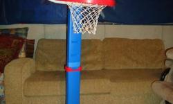 Barely used! Adjusts to 4 or 5 heights. Water goes in the bottom to keep it grounded. Comes with little basketball. (We have tape around ours to make it taller....easily removed.). Comes apart into 2 pieces.