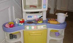 Little Tikes Family kitchen is awaiting little chefs in training.  Comes with all the accessories in picture.  Stove door opens and has room for storage.  In excellent condition smokefree home and will deliver if in Brantford.  Very well made durable toy.