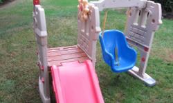 Cute Little Tikes toddler swing, climber & slide. It is in used outdoor condition.
