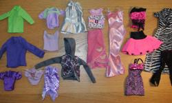 15 plus dresses, 10 plus tops and 10 plus bottoms!
Total = 51 pieces of assorted Barbie clothes.
Smoke free home, clean clothes.