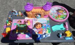 Several Dora the Explorer playsets, collections of stories, clock etc. $25 the lot, or make an offer on an individual item. Some are posted separately. See seller's list for details.