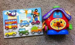 Block puzzle$3 Abc and teaches counting and time as well hardly used lights up and even sings $12 Winnie pooh puppet $4 flower mobile lights up and sings $10 giraffe Teddy with blanket brand new $12 train $3 leapfrog train makes sounds $6 baby roll n