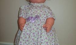 This Vintage 1971 Mattel Facial Expression Doll is in excellent condition. Her hair is excellent and she works perfectly. When her head is facing forward she is smiling, when you turn it to the left she pouts. She is in her original clothes and shoes and
