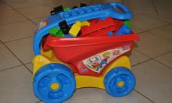 Mega Bloks and dump wagon. Brimming with bloks. Very good condition.