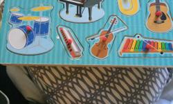 Instrument sound puzzle (guitar, drums etc)
great condition
Melissa and Doug brand