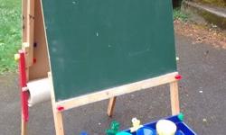 One side chalk board, other side dry-erase. Includes all original clips, hardware, paint pots, brushes. Good used condition.