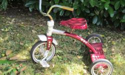 Red & white 10" metal trike from Goldstream Bikes. Paid $62.99 new (still have the receipt). A great first ride. Some rust spots but otherwise great condition - excellent quality.
PF/SF home.