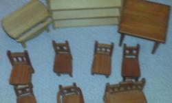 10 pieces of wooden doll furniture. 6 chairs, drop leaf table, bench, table, bookcase.
If you require more information or to make arrangements to view this item please call 306-352-1997. I can only take phone calls on this item. Do not e-mail me as I