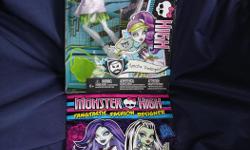 BRAND NEW, still in sealed box, never displayed or removed from box, Monster High Ghoul Sports Spectra Vondergeist Doll. Plus Free bonus 2014 brand new book "Monster High Fangtastic Fashion Designer, Stickers Included".
Spectra Vondergeist doll also comes