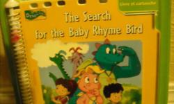 Fisher Price Power Touch book and cartridge- "The Search for the Baby Rhyme Bird", for ages 3 to 5 years." A baby rhyme bird is missing! The friends work together in Dragon Land to find her, but first, they have to figure out what rhyme birds really