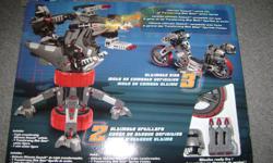 Brand new, still in box Mega Bloks Transforming Blok Bots "Ultimate Assault" for ages 7 and up. 230 pieces. Triple transforming Ultimate Assault vehicle, 1 Transforming Blok Bots action figure, and 1 mini action figure. Ultimate Assault vehicle fits all