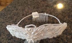Very nice Tiara with sequins and pearls, great for special occasions OR for playing dress up.
These are NEW, bought from a wedding store close out.
Pick up in S.E. Regina. I have several of these, if you're interested in them for a birthday party or other