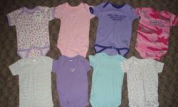 Eight cute onesies in great condition!!  Size 3 months.  Only worn by one child (top left in picture has never been worn, still has tags on).  The bottom 4 in picture are Carters brand.