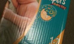 I have half of a box (still sealed in plastic) of Pampers Baby Dry 1-2 size diapers that my baby has grown out of. They are good up to 15lbs. The box says it has 192, so I would assume the half pack has 94. They have been great for the jump in sizes