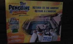Penguins of Madagascar Return to the Habitat board game in excellent condition.