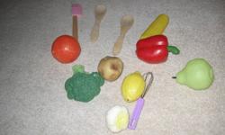 8 pieces of large play food. Also includes apron, oven mitt, chefs hat, pot holder, wooden spoon, spatula and whisk. Asking $15.00 for everything