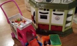 Everything they need! Play kitchen with picnic basket and shopping cart and food and accessories.