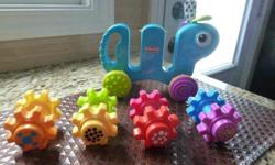 Playskool- Push 'N Stack Gears
* Can stacking the removable and interchangeable gears
* It's hands-on learning with go-go-go fun
* Features gears that spin while the critter figure is rolling and can even be removed and stacked for new fun as baby gets