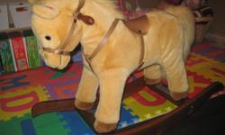 A genuine wood and plush rocking horse. Nicely finished. Complete with saddle and bridle. He makes galloping sounds!
 
Very Good Condition
Smoke Free Home