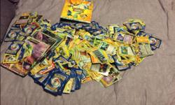 Hundreds of Pokemon cards and a binder. Several of the large cards as well.