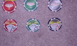 500 chip poker set with 2 sided denominational chips, on one side is the famous Las Vegas sign and on the other side is a royal flush of different suits for each color. Set includes 200 red $5 chips, 165 green $25 chips, 100 black $100 chips, 25 purple