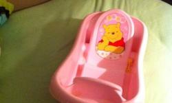 I am selling an infant/toddler bath tub.  It comes with a unique sling which supports and cradles your newborn comfortably and safely.