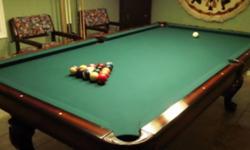 Pool Table,4 ft.by 8 ft.I inch slate bed.Comes complete with cover ,cues,light and chair that accomodates acessories.Like new ,used 3 times,new cost 5875.00,sacrifice for 2495.00..Ph.306-221-0134