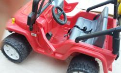 FIsherPrice powerwheels , Red jeep comes with battery contact user by email for more information.