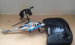 Toy remote control helicopter. The copter recharges right off of the remote control, which takes 6 AA batteries. Pretty fun, but I never use it.
Text Joel at 306-530-8820 to inquire, thanks!
