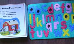 Floor barnyard puzzle and alphabet puzzle, both for $5