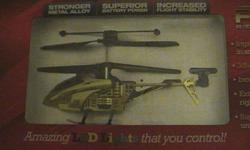 Fun Radio Controlled helicopter, small enough to use indoors. Basically new, I bought it for $50.00 as a gift, but the recipient already has 1.