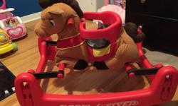 Radio flyer rocking horse. In excellent condition. The seat harness can come off as you child grows.