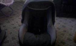 Cosco Black & Grey rear-facing carseat.  Used for only 6 months.  I've included the a black carseat cover. Carseat expires 2015.
 
ALSO I have a garbage bag full of baby clothes about 6-12 months I would say.  Includes bibs, shoes and boots, and a few