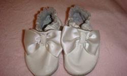 I'm selling my daughter robeez shoes size 0-6 months mint condition i'm asking for $8.00 each.