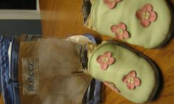 Robeez slippers for 6-12 months.  Mint colour with pink flowers.  Great condition