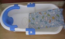 Safety First Bath Tub
The bathtub is great from newborn to toddler - four different stages of use:
1 - Removable sling so you may bathe your newborn infant in a sink or perfect to use sling alone on a towel to sponge bathe your infant. Sling is made out