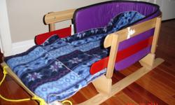 This sleigh is as new and has only been used a couple of times. Includes a bumper pad and fleece blanket to fit the sleigh. Can be used for baby or toddler. $30.00