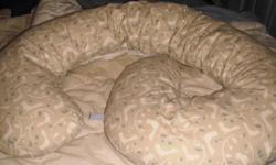 Selling my snoogle maternity body pillow as baby is due any day now and I no longer need it. Makes sleeping while pregnant so much more comfortable! The one I am selling is light brown with white birds on it, very cute. So comfy even my husband enjoyed
