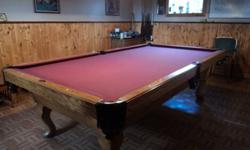 Solid oak snooker table 50.5 x 100.5 ,30 year anniversary edition with speed cloth. Comes with table overhead lights, cover, cues, etc. Please call Cheryl or email with a phone number to call back